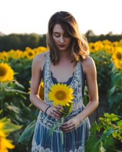 wild radiance - online Course for women woman with sunflower