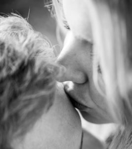woman kissing mans forehead. One of two mistakes in relationships blog.