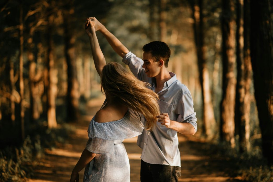 Couple dancing outdoors